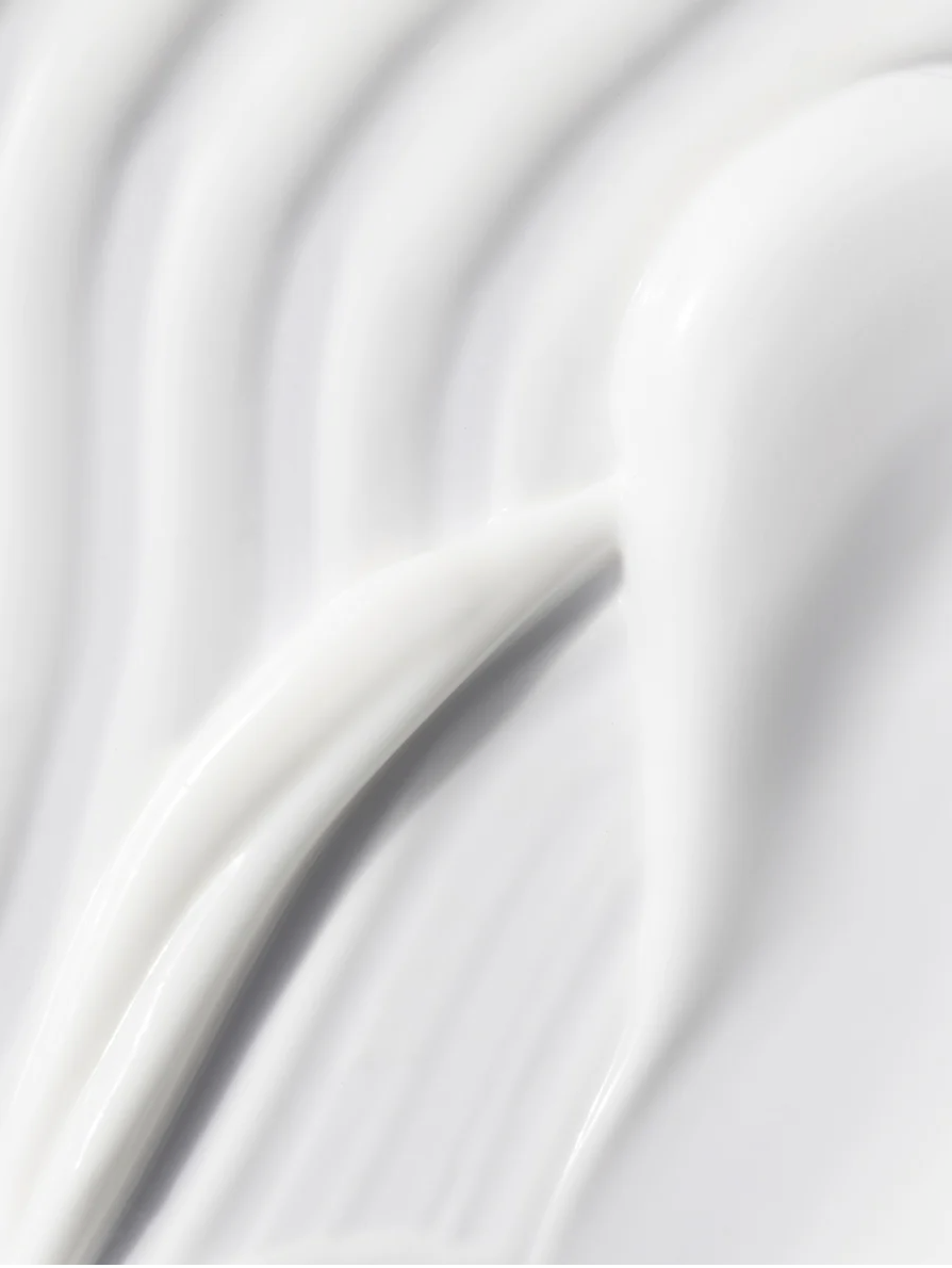 Close-up of Skinity Blemish Care Moisturiser smooth white cream texture for acne-prone skin.