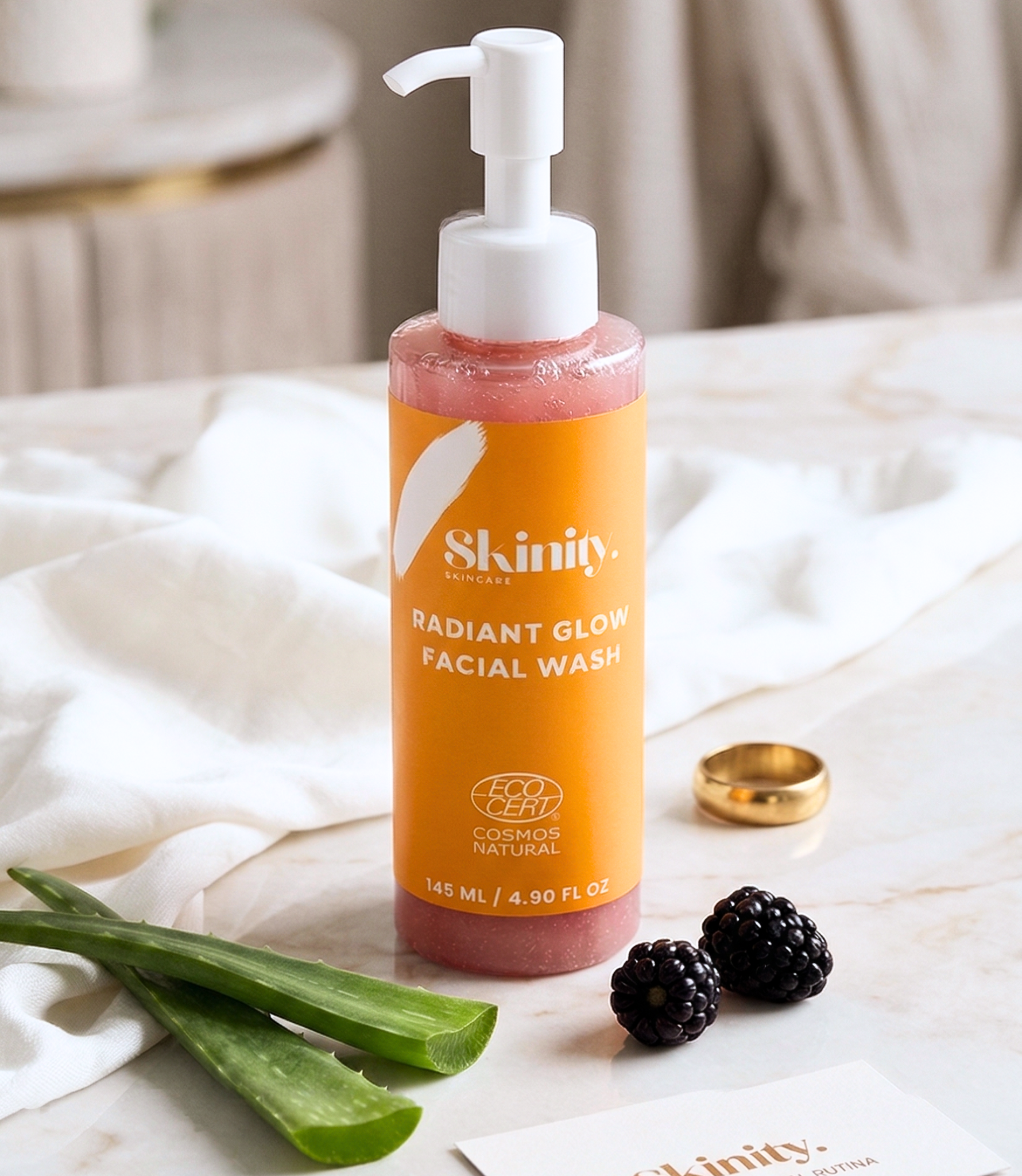 Radiant Glow Facial Wash For All Skin Types in a stylish bottle with natural ingredients like aloe and blackberries.