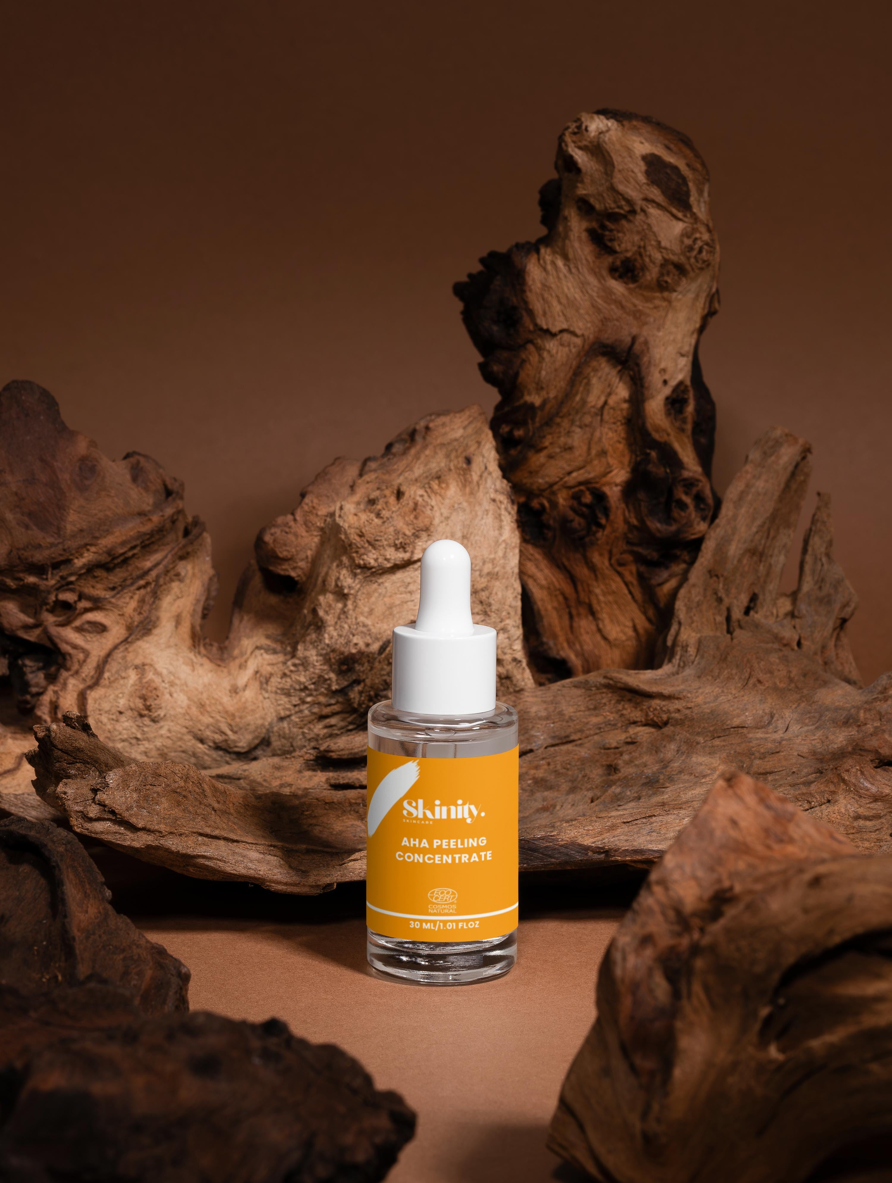 AHA Peeling Concentrate For Skin placed on wooden background, highlighting its exfoliation benefits.