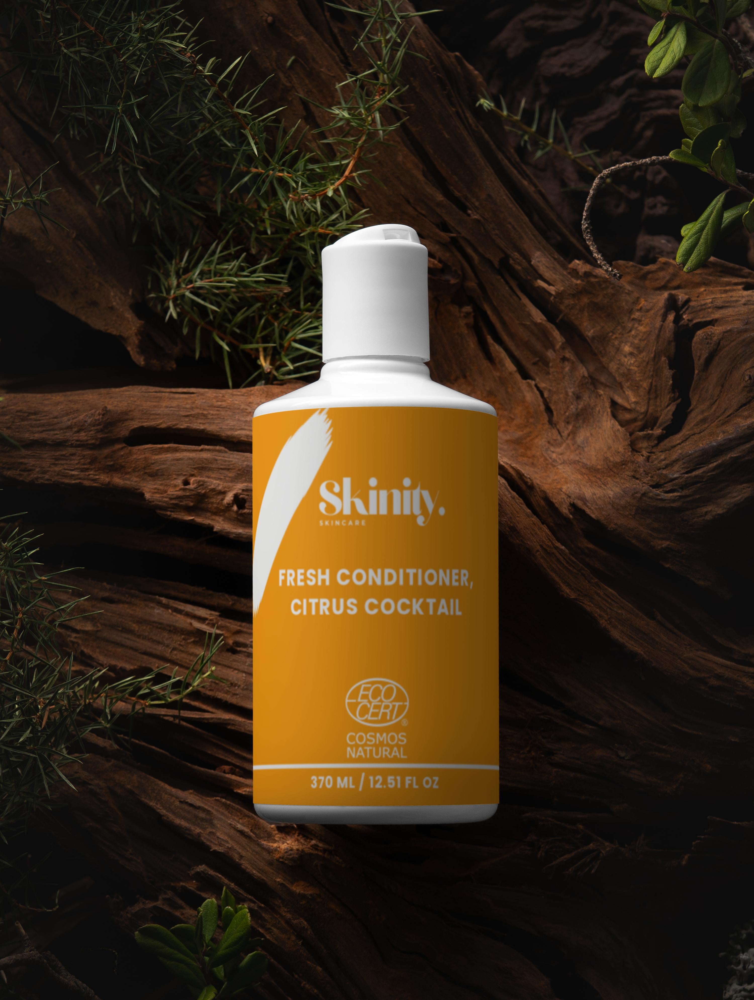 Fresh Conditioner Citrus Cocktail in a yellow bottle on a wooden backdrop, perfect for everyday hair care.